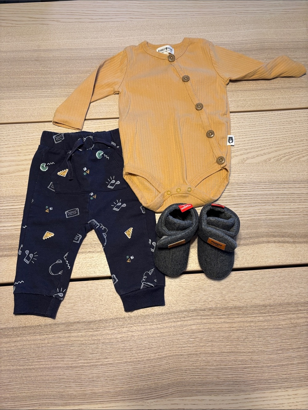 Asymmetric Button One-Piece Bodysuit in Mustard